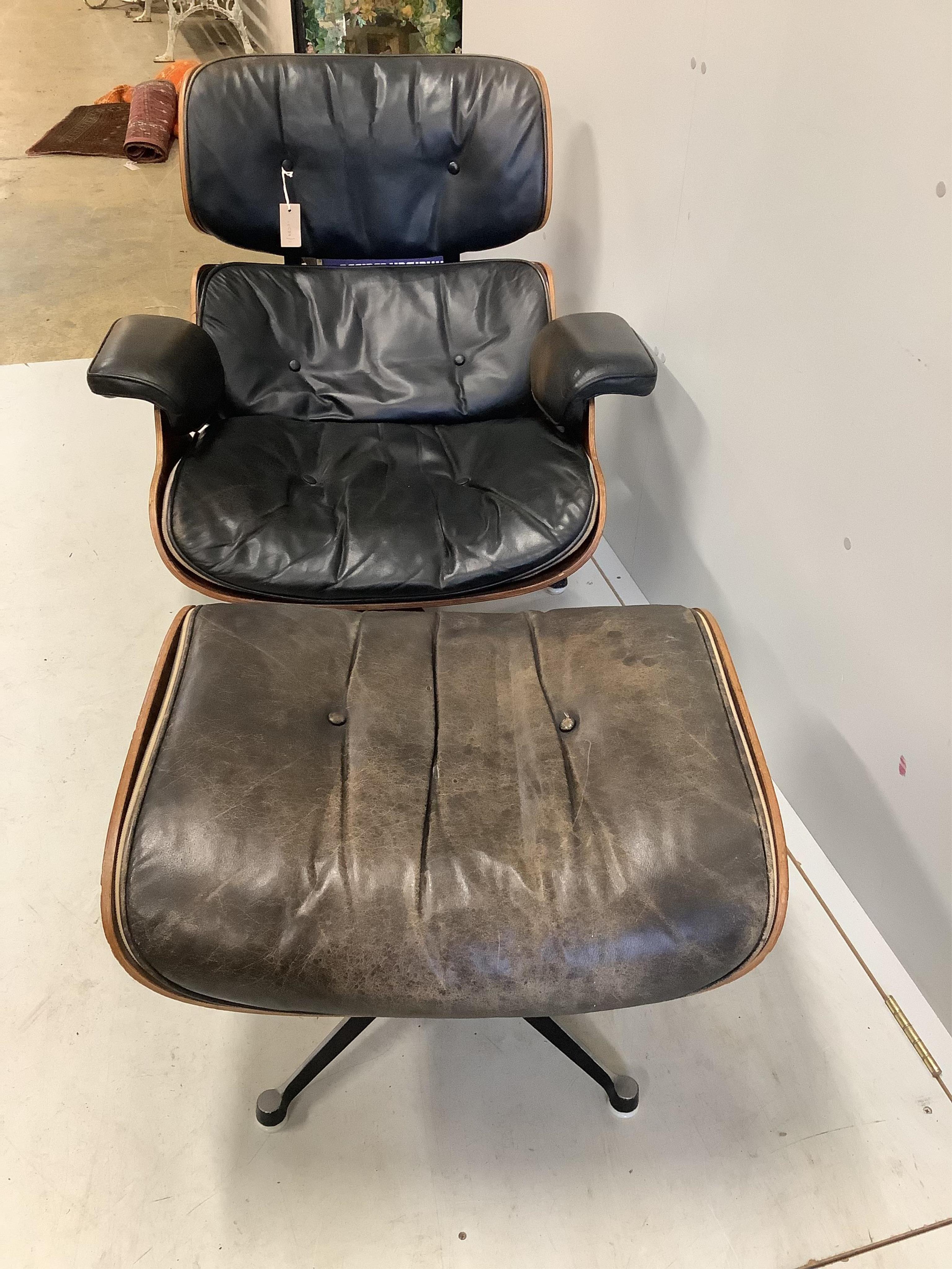 Charles and Ray Eames for Herman Miller Interform, an Indian rosewood and black leather lounge chair and ottoman, circa 1960, chair width 85cm, depth 68cm, height 81cm. Condition - poor to fair